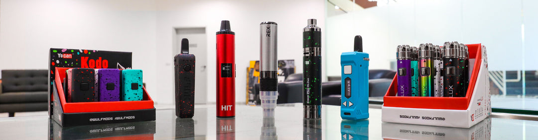 Wholesale Yocan Products standing in a row on glass table in office building
