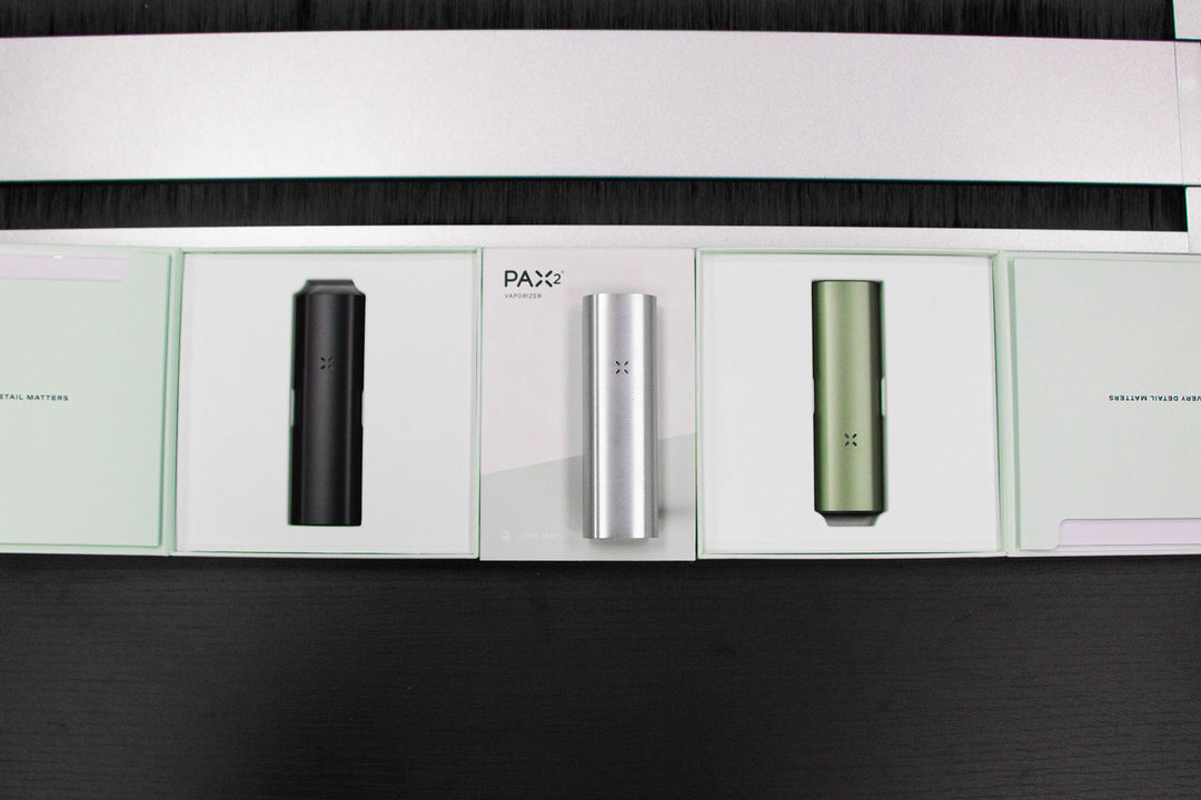 Wholesale Pax products laying down on black countertop inside office