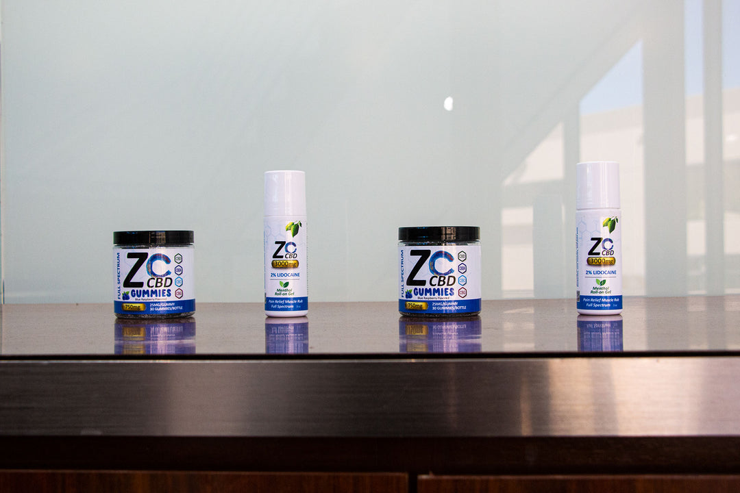 Zo CBD Wholesale products standing on table inside office building