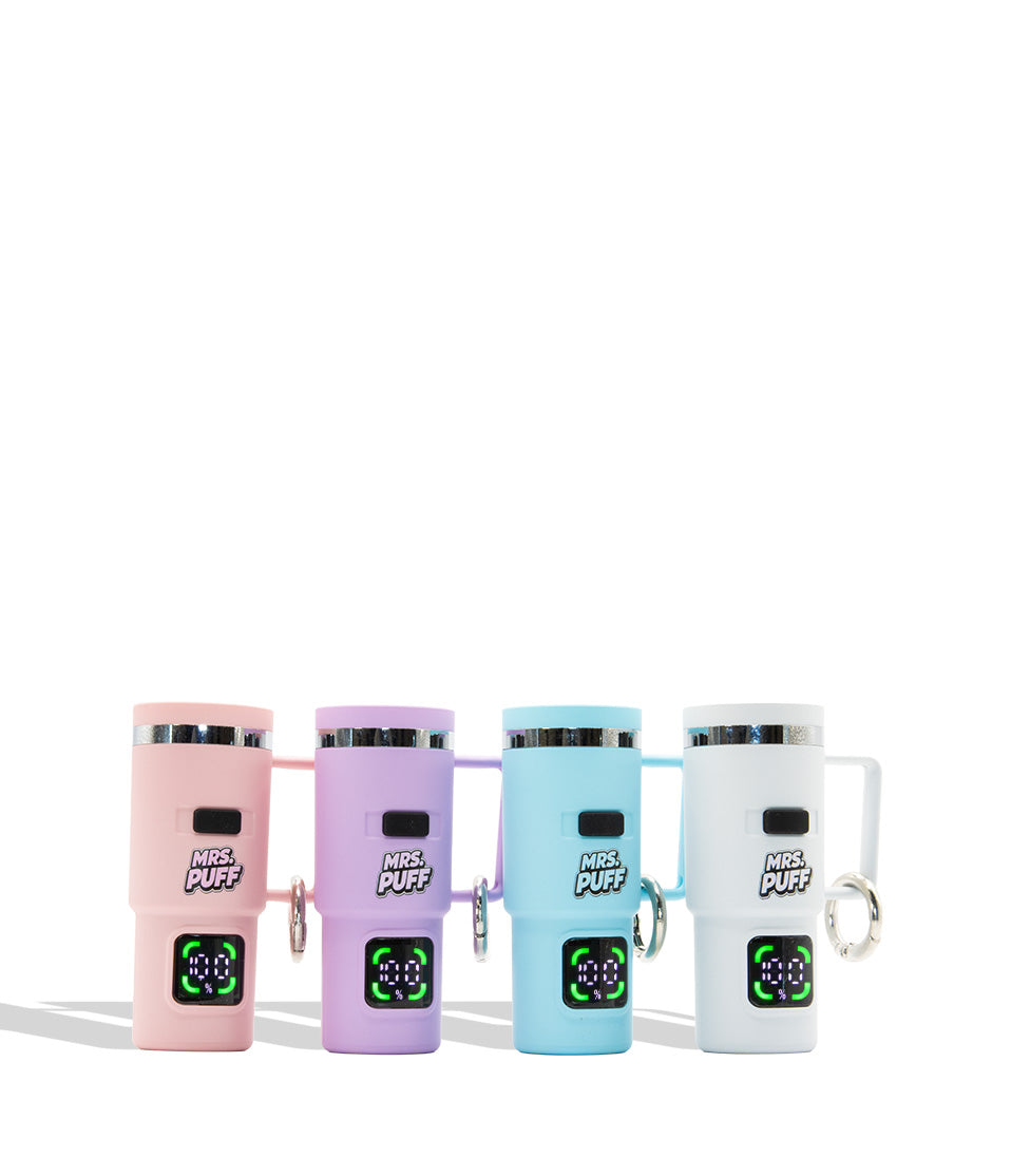 Four insulated travel tumbler cups vape devices 510 battery in pastel pink, lavender, light blue, and white, lined up side by side on a white background. Each cup has a handle, a small black label reading &