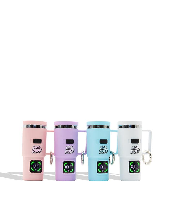Four insulated travel tumbler cups vape devices 510 battery in pastel pink, lavender, light blue, and white, lined up side by side on a white background. Each cup has a handle, a small black label reading &