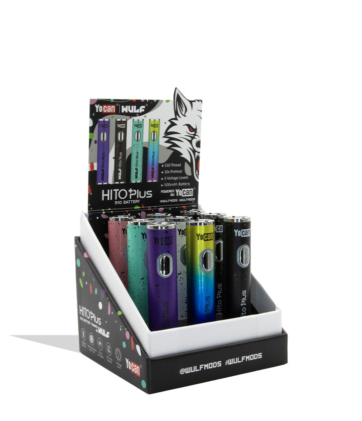 A retail display box containing nine Yocan x WULF Hito Plus 510 batteries in different colorways (purple, blue/yellow gradient, and black) with a branded cardboard backing card featuring a wolf graphic on a white background in quarter view angled.