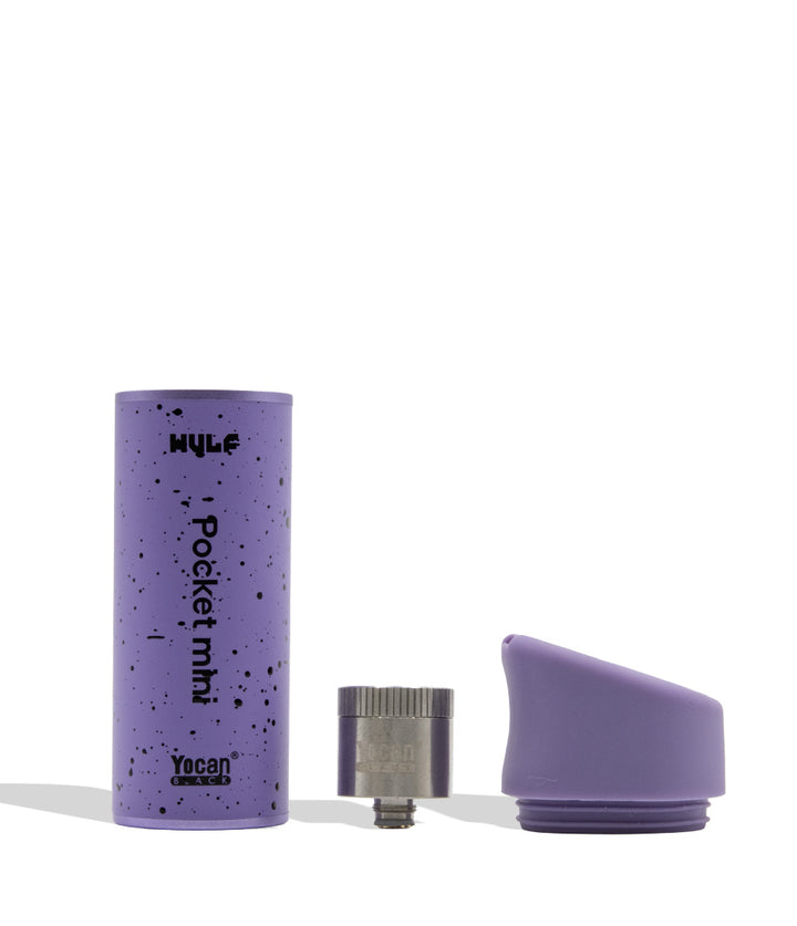 A purple speckled cylindrical portable vaporizer shown with its metal tank / atomizer attachment and matching purple silicone lid on a clean white background. Disassembled WULF MODS x Yocan Pocket Mini portable concentrate vaporizer