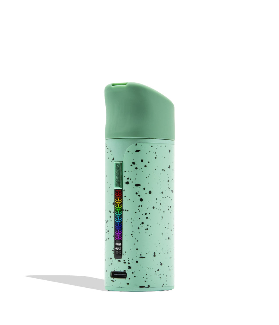 WULF MODS Pocket Mini portable concentrate vaporizer in teal/mint with black spatter pattern details, featuring a vertical rainbow LED indicator light on the side, shown against a plain white background.