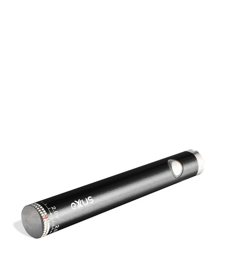 Cosmic black laying down Exxus Vape Twistr Cartridge Vaporizer on white studio background