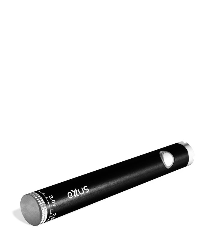 Cosmic black laying down Exxus Vape Twistr Cartridge Vaporizer on white studio background