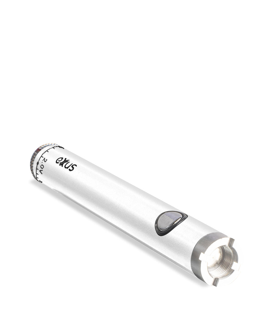 Pearl laying down Exxus Vape Twistr Cartridge Vaporizer on white studio background