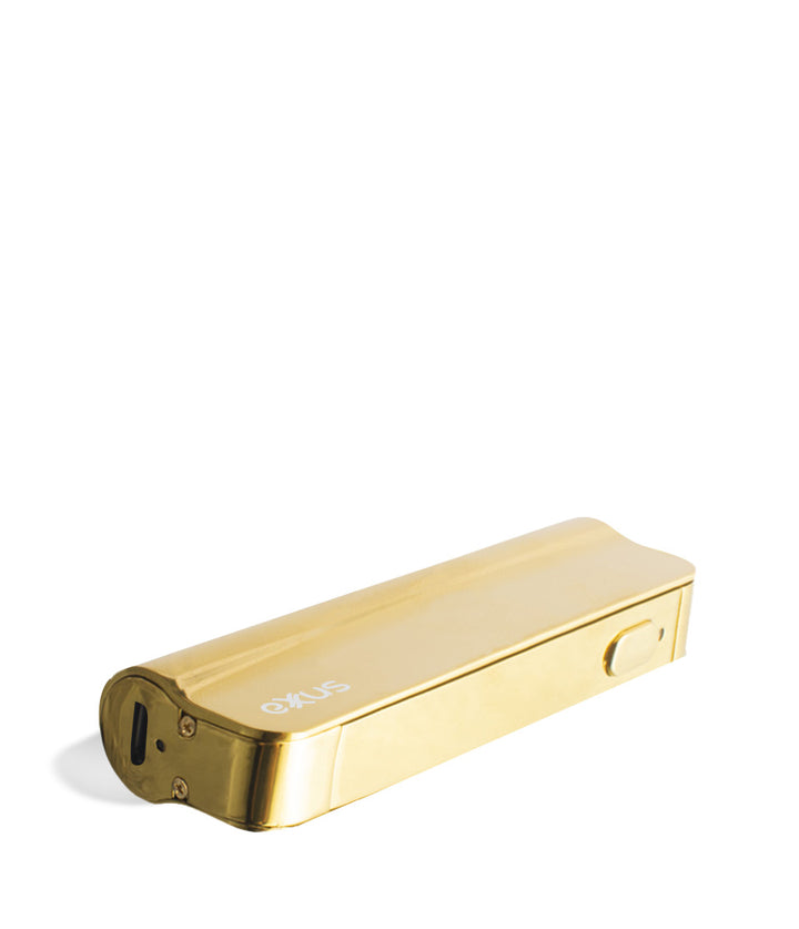 Gold laying down Exxus Vape Snap VV Cartridge Vaporizer on white studio background
