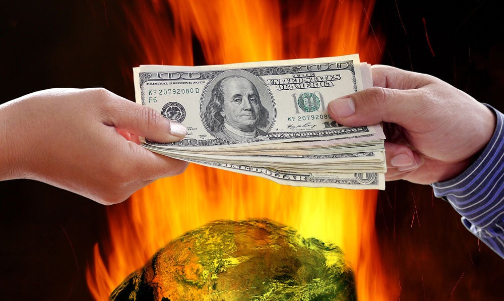 People exchanging cash over a burning piece of wood