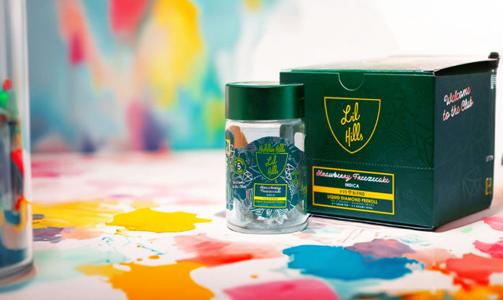 Hidden Hills Bussdown Jawns on artist surface with paint splatters nearby
