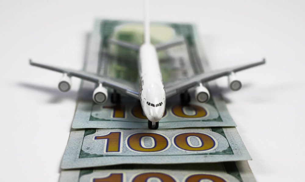 Business runway representation with mini plane over cash flow