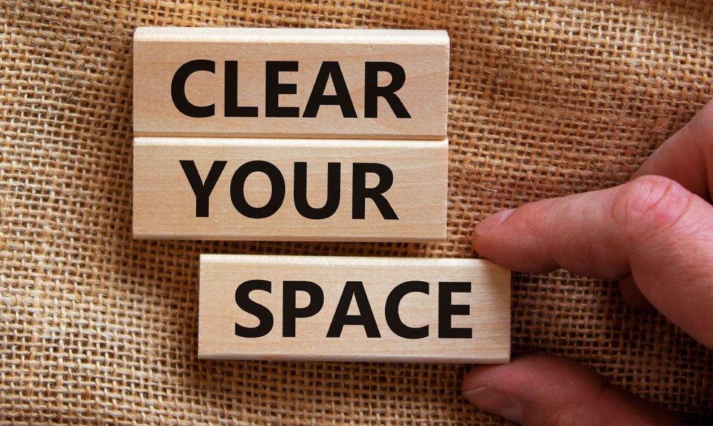 Clear Your Space blocks on textured surface
