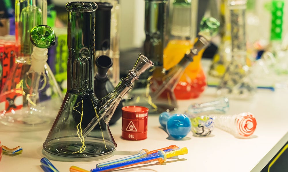 Water Pipes and other Glassware together in a bundle inside smoke shop
