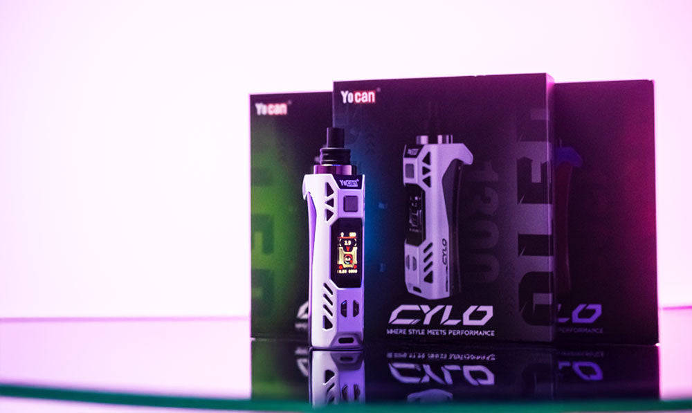 Yocan Cylo resting on reflective glass display platform