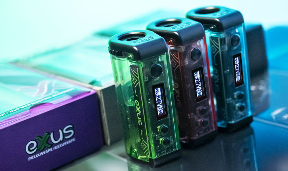 Exxus Adapt standing next to each other near packaging on top of reflective surface