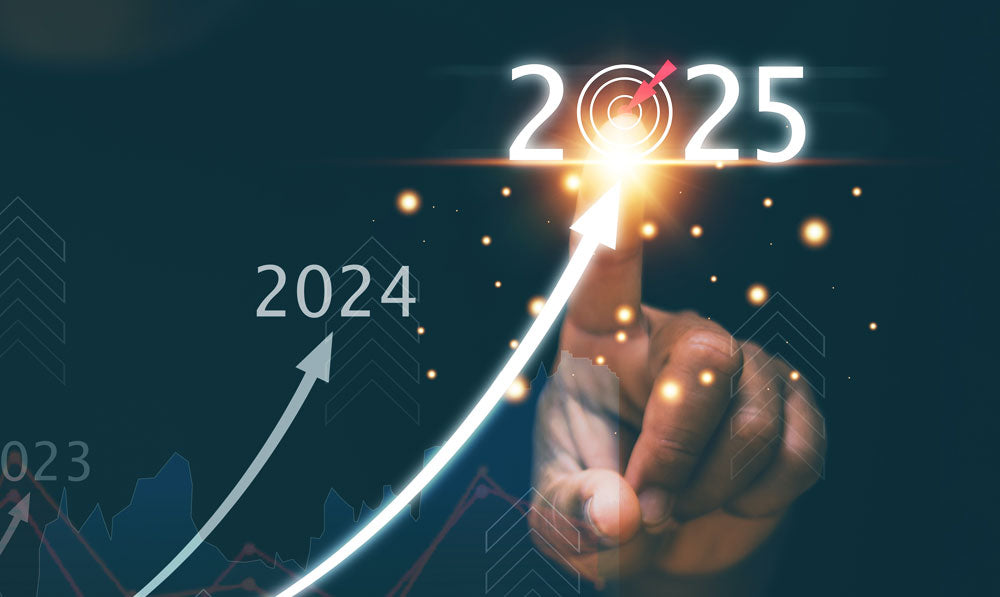 Person analyzing year to year trends from 2023 to 2025