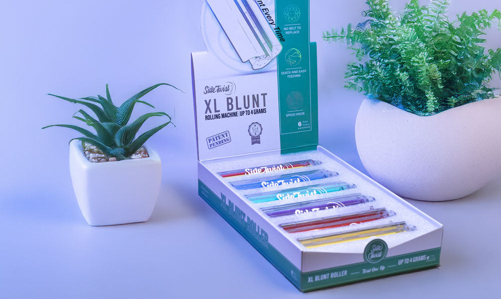 Side Twist XL Blunt Roller 6pk standing on white table with plants