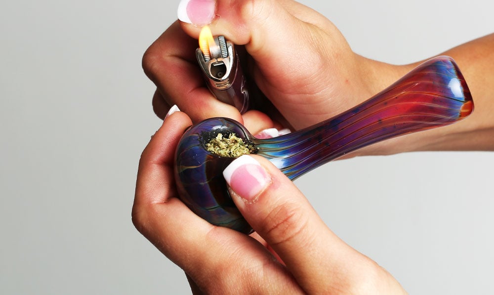 Woman Holding Hand Pipe White Background