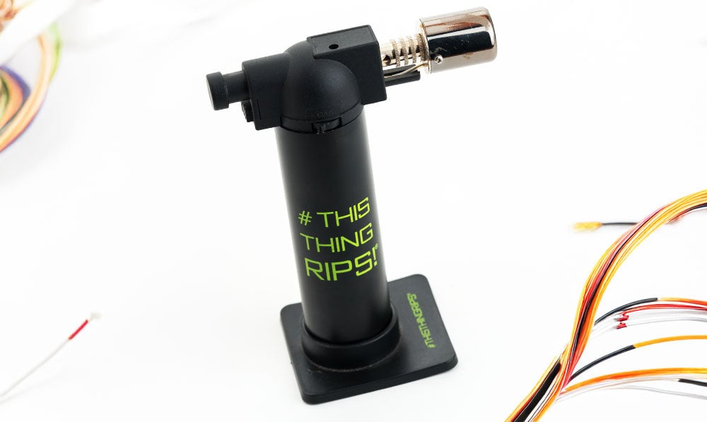 Dab torch with "This Thing RIPS!" on the side