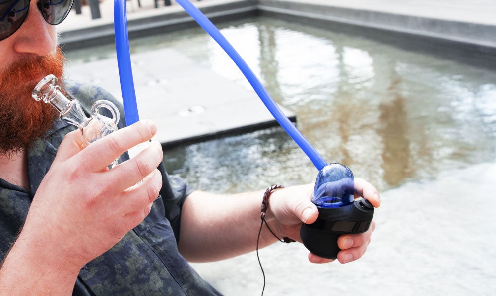Man holding Wulf Link attached to Wulf Revo