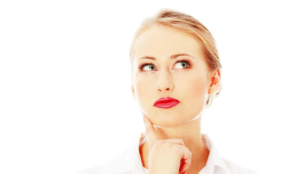 Businesswoman Thinking About Questions