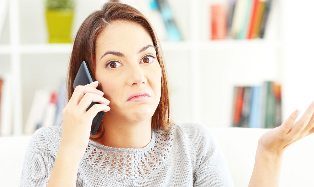 Confused Woman On The Phone
