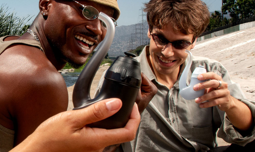 Group of people using Puffco New Proxy on a hike
