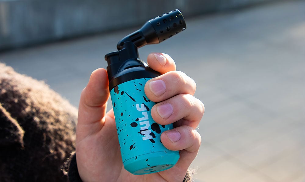 guy holding Wulf Roar Torch and park