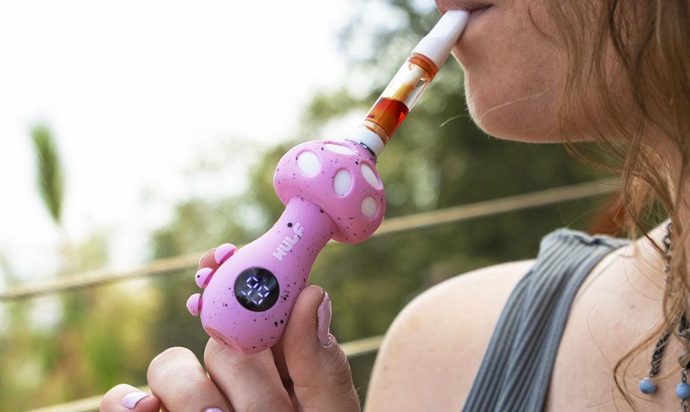 Woman using Wulf Tryp on a park trail