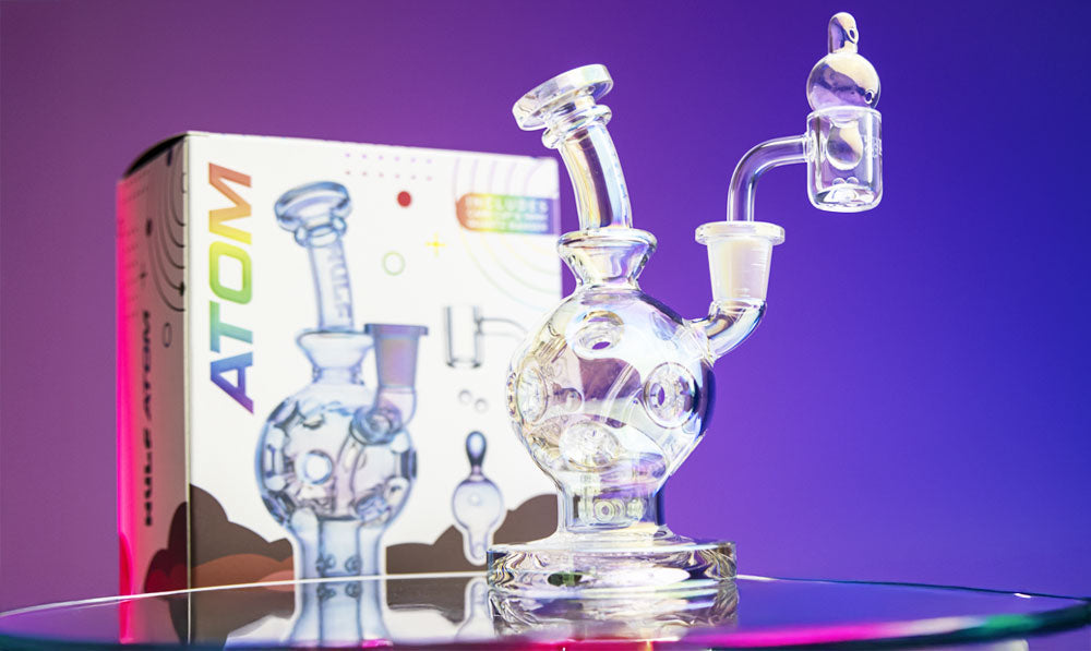 Wulf Mods Atom Dab Rig on colorful reflective surface