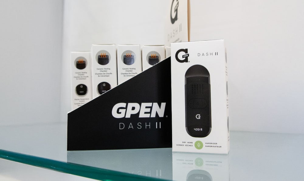 G Pen Dash 2 display standing on glass shelf