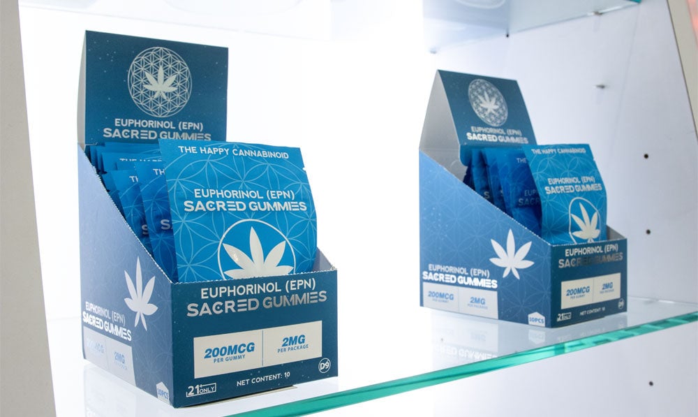 Sacred EPN gummies display shelf in store