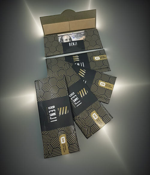 Benji OG Papers on platinum glossy display with light shining