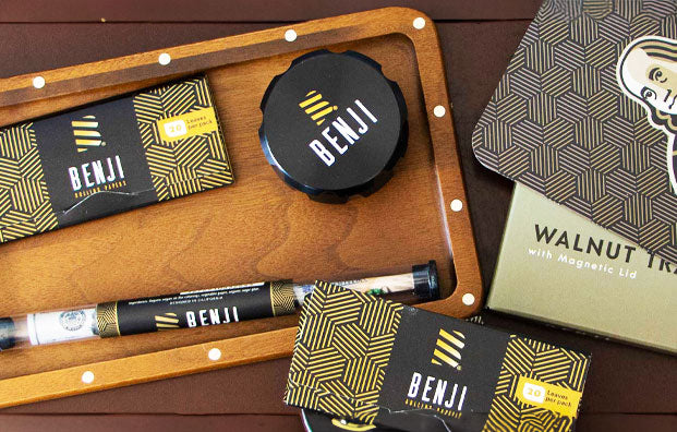 Benji OG Products resting on wooden table