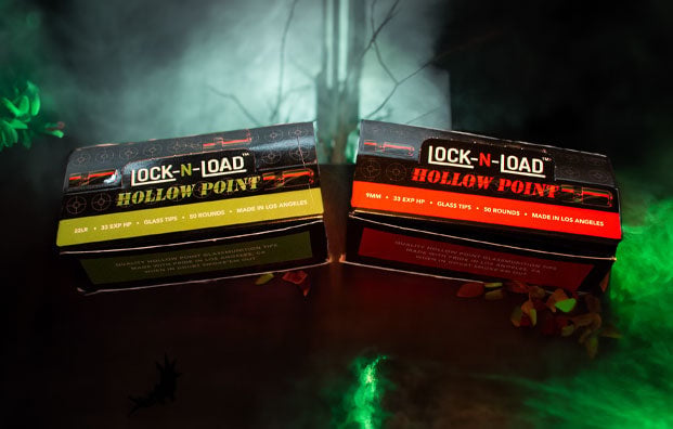 Biohazard products on dark display with spooky green lighting and creepy dead tree nearby