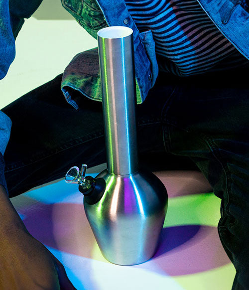 Chill Pipe with rainbow lighting between man's legs