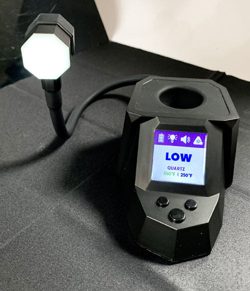 Dab Rite Resting On Black Display With Screen On