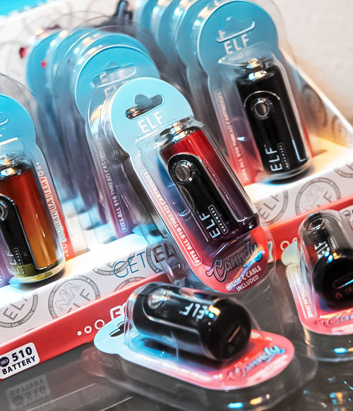 Elf Hardware Canndy resting on glass reflective surface