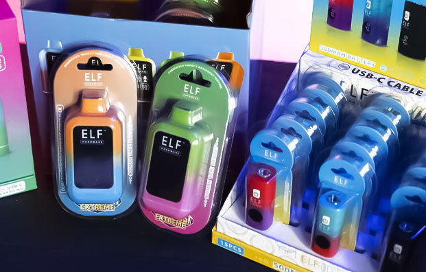 Closeup of Elf products on dark surface
