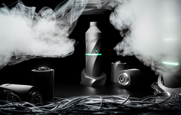 Focus V products on dark display with wires and smoke nearby