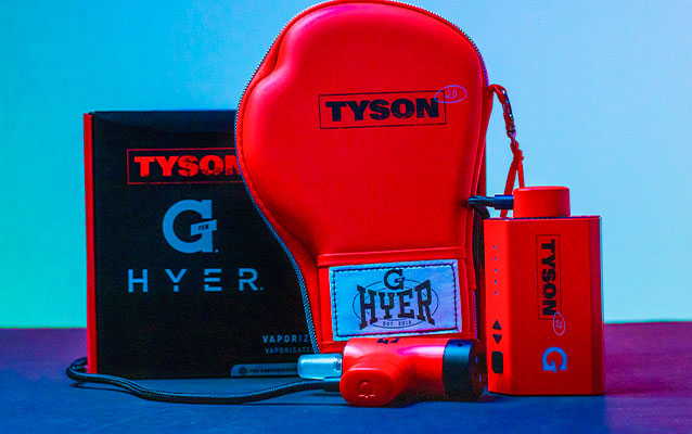 G Pen Hyer Tyson standing on table with blue background