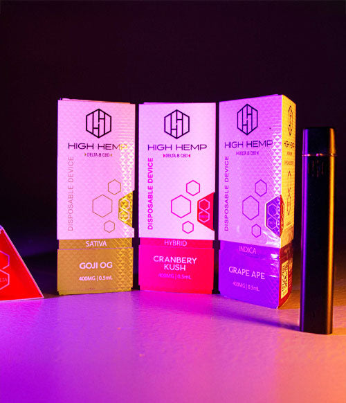 High Hemp Disposables standing on surface with pink lighting