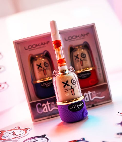 Lookah Cat in a white display box with cat stickers scattered