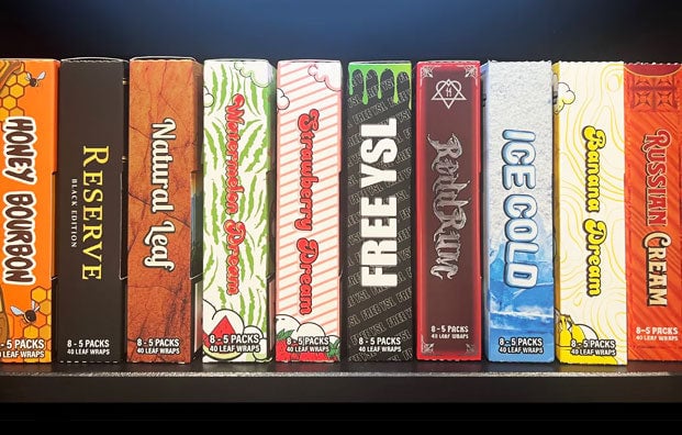 Loose Leaf products standing in a row on bookshelf