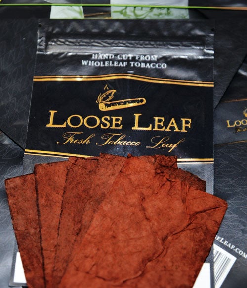 Loose Leaf wraps open on desk with packaging