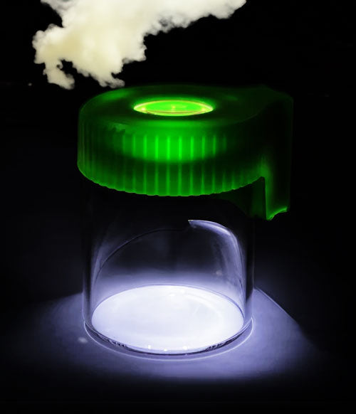 Mag jar on in dark room with smoke nearby