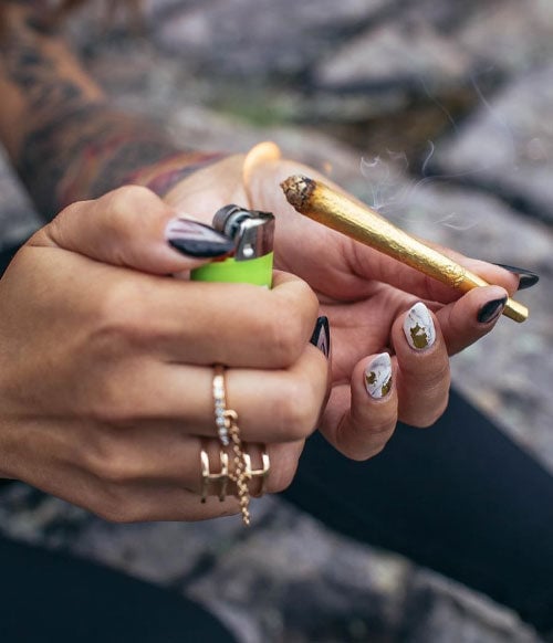 woman holding lighter and Shine Joint