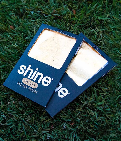 Shine Rolling papers on grass