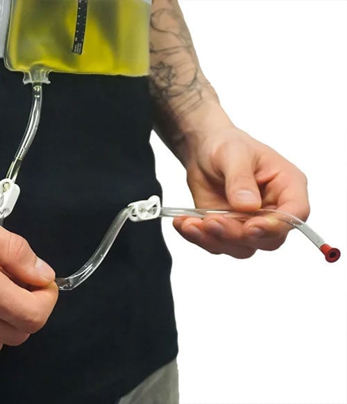 Man usinig Synthetic Urine belt with white background
