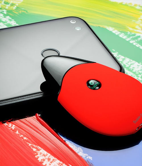 Suorin Drop resting on tablet with paint